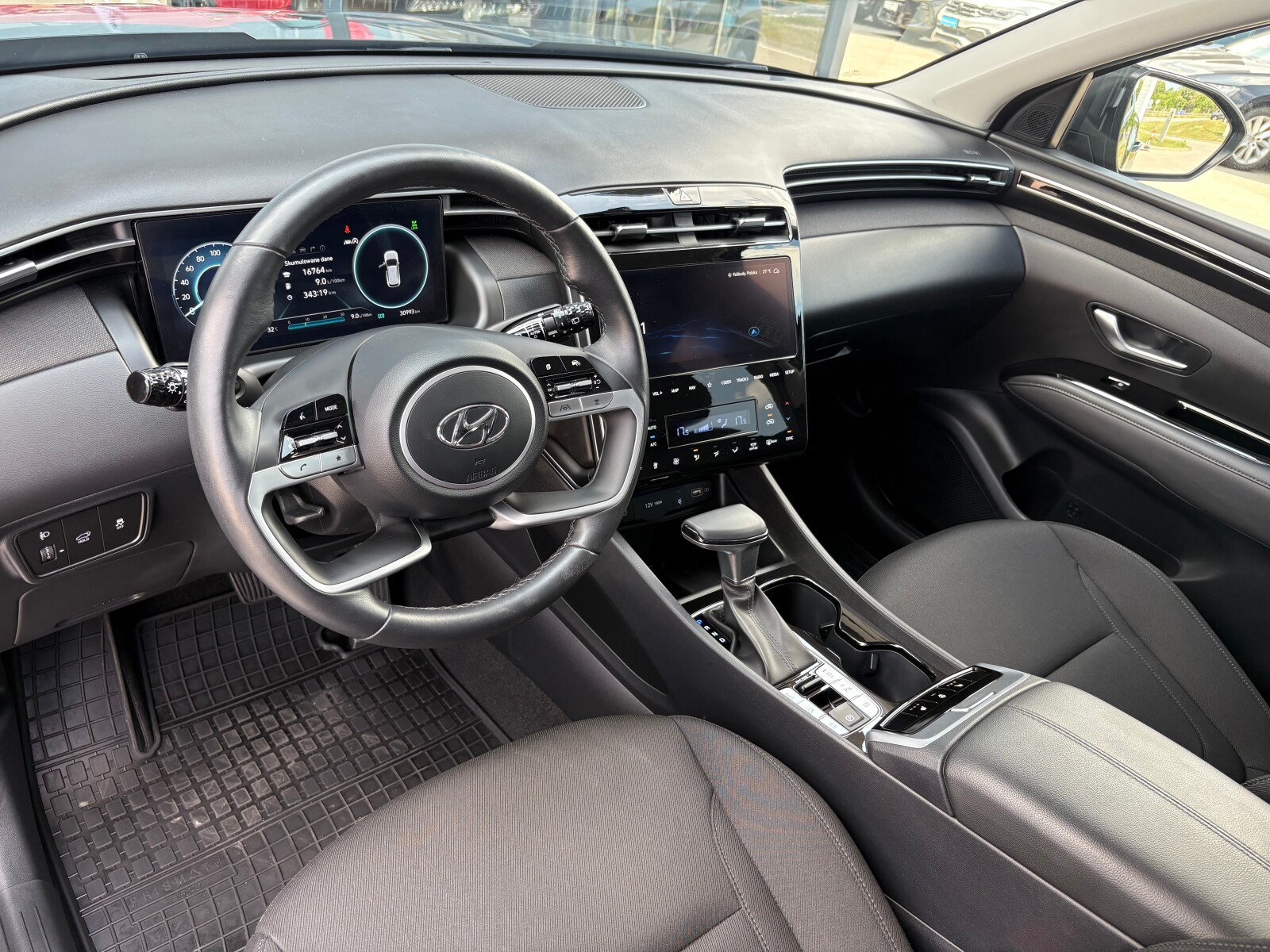 Hyundai Tucson - zdjęcie 11
